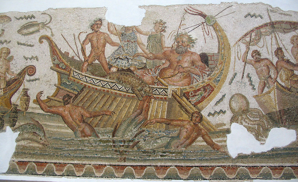 Dionysos-Bacchus ja delfiineiksi muuttuvat merirosvot. Roomalainen mosaiikki, 2. vuosisata jKr. Kuva: Giorces, Wikimedia Commons. Museo del Bardo, Tunisia.